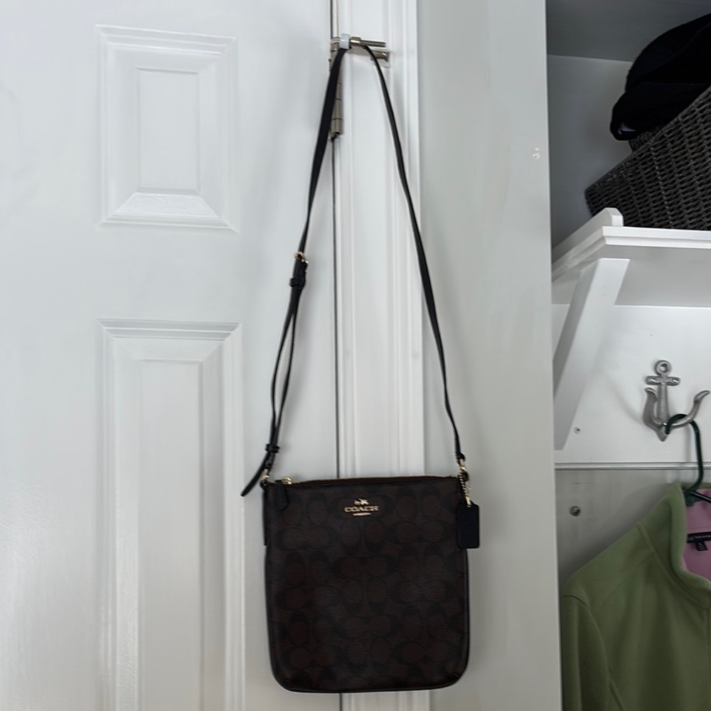 Coach Brown Messenger Bag with Adjustable Strap and Textured Finish